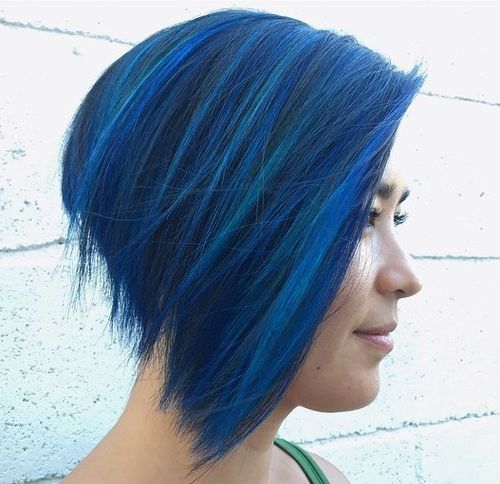 angled choppy bob with blue highlights