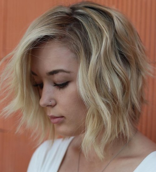 Angled Wavy Blonde Bob with Shadow Roots