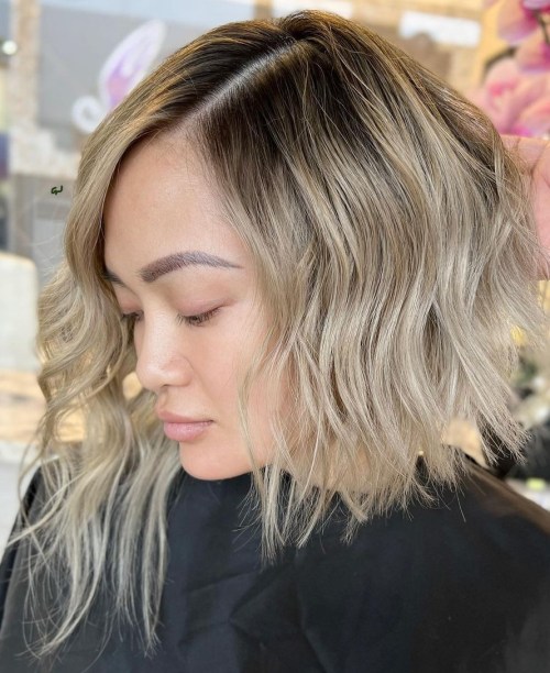 Blonde Asymmetrical Bob with Dark Roots