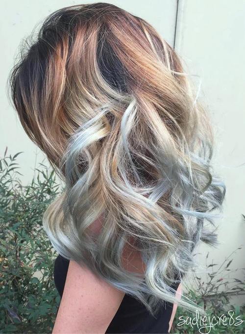 brown blonde hairstyle with light blue highlights