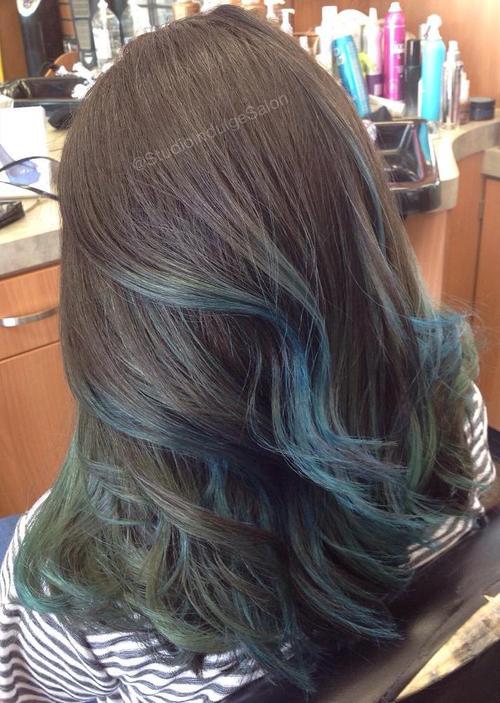 brown hair with pastel blue balayage