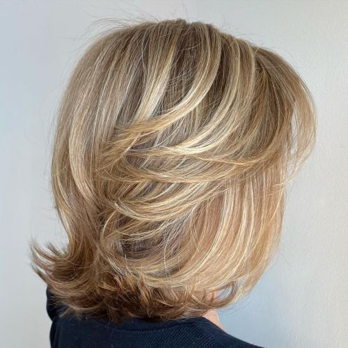 Shoulder Length Feathered Blonde Hair