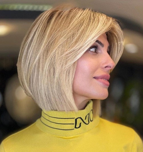 Sleek Blunt Bob with Long Curtain Bangs